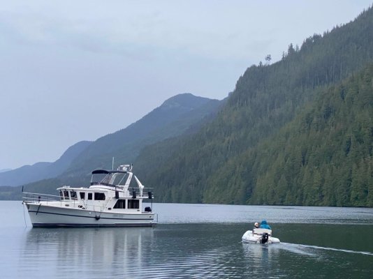 Taking the Dinghy back to boat in Forward Harbour.jpg