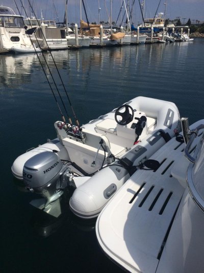 dinghy on back of boat.jpg