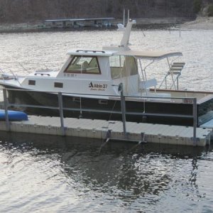 The restoration and modifications were done in Florida. The boat now spends a few months in a fresh water lake and the rest of the year in an enclosed