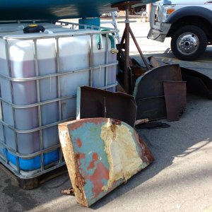 temporary fuel storage tank and pieces of old tank