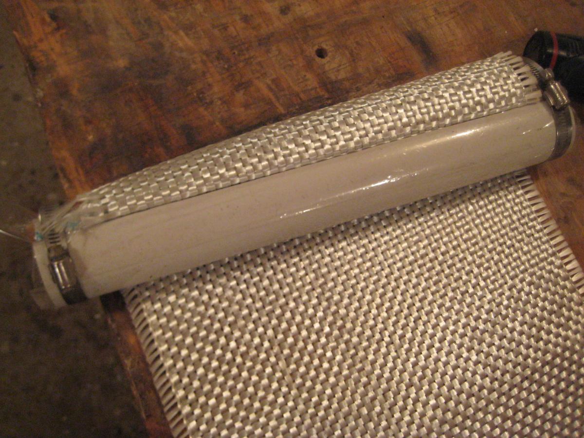 2016 06 11 MastTubes 003  Pinched the pre-cut fiberglass into the tube and clamped it with hose clamps.