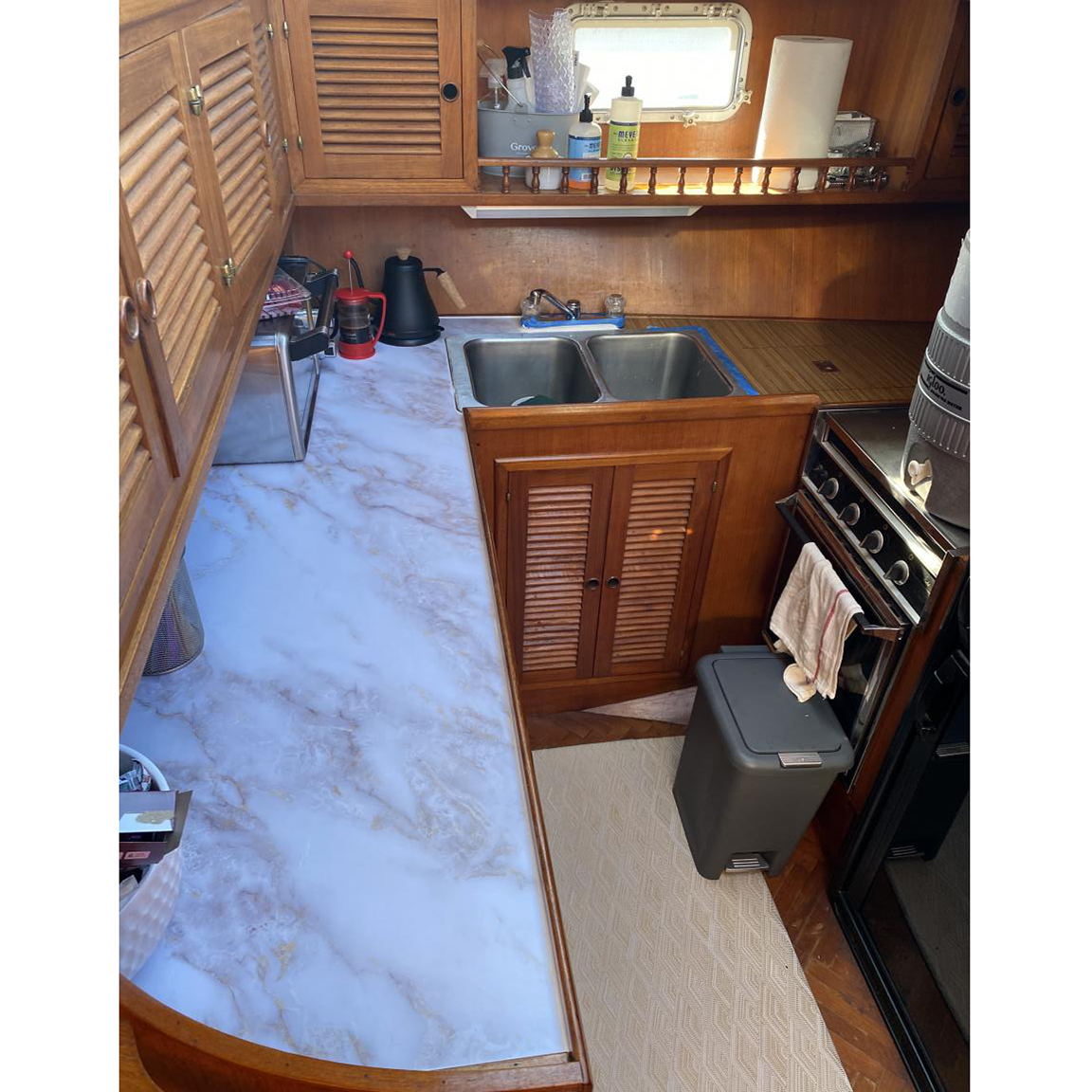 Faux Marble countertop in galley.