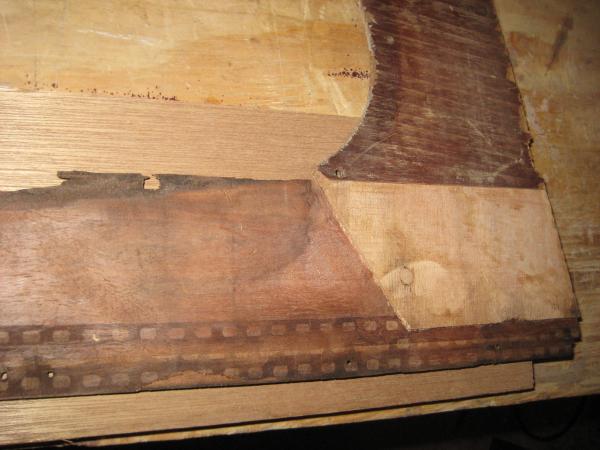 Joints in the veneers are staggered so as to splice the new material to the old.