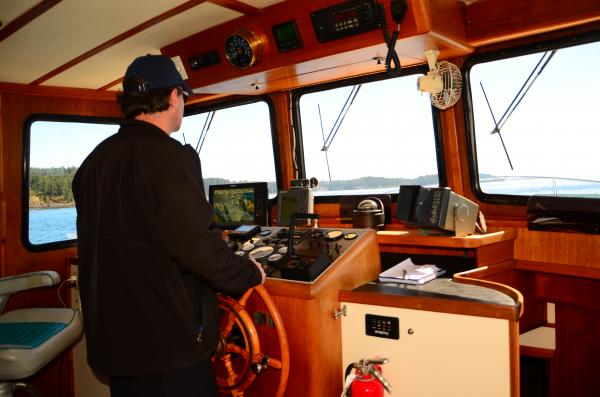 Kelly at the Helm