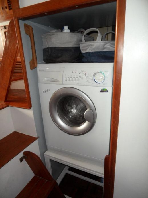 KK42   Washer Dryer combo by stairs