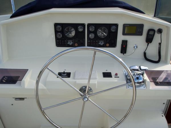 Original flybridge helm when we bought the boat.