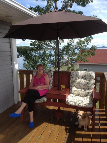 Peggy Sue sitting on the deck