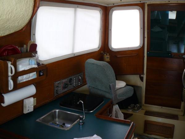 port windows with sunbrella interior covers (curtains)