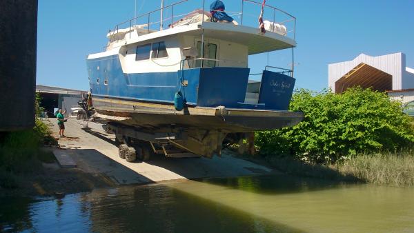 Re floating for the tow after the drug boat arrived from Vancouver Island on a trailer. Only to be towed to the lift for storage on the hard, until th