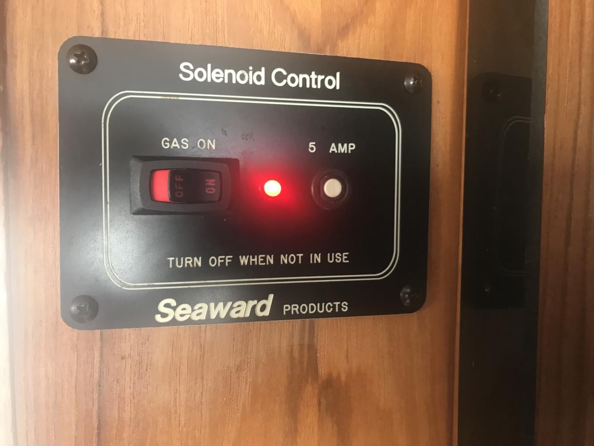 Remote switch in the galley area.     It is very convenient and safe to turn this off when we are not using the stove.   A lot easier than climbing th