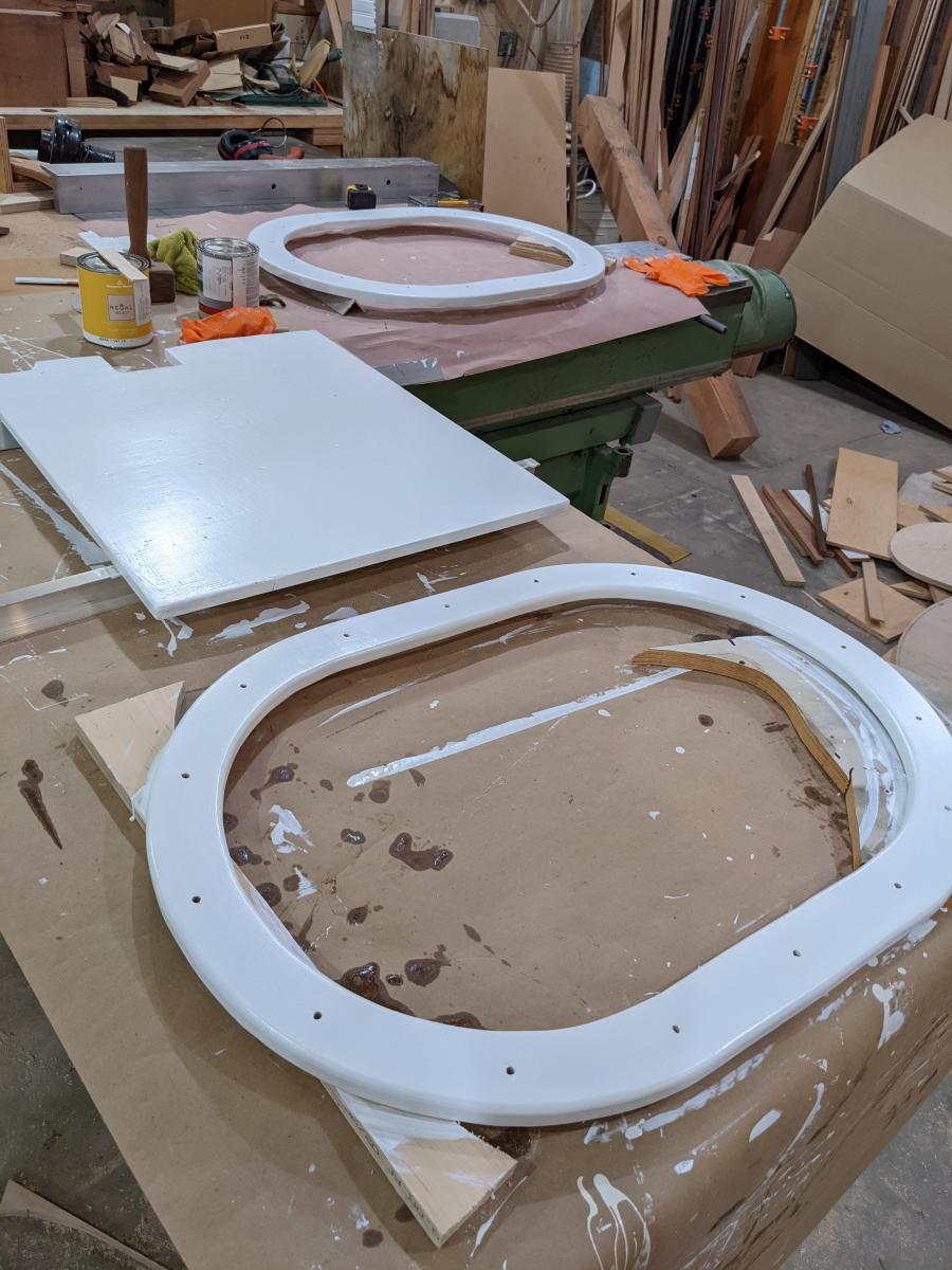 Table saw as paint shop, reinforcing/mounting rings for Freeman engine room hatch. Rings  are one piece 3/4" 9 ply to tranfer load around the big hole