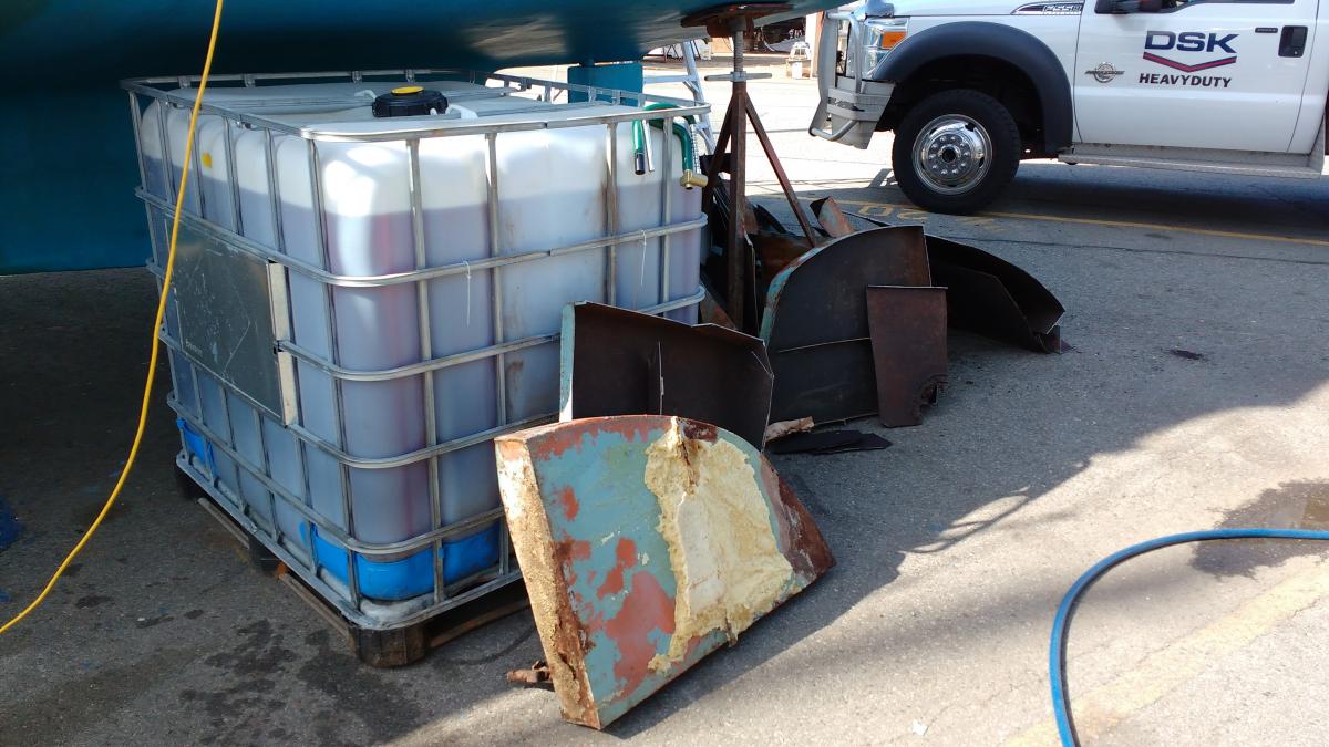 temporary fuel storage tank and pieces of old tank